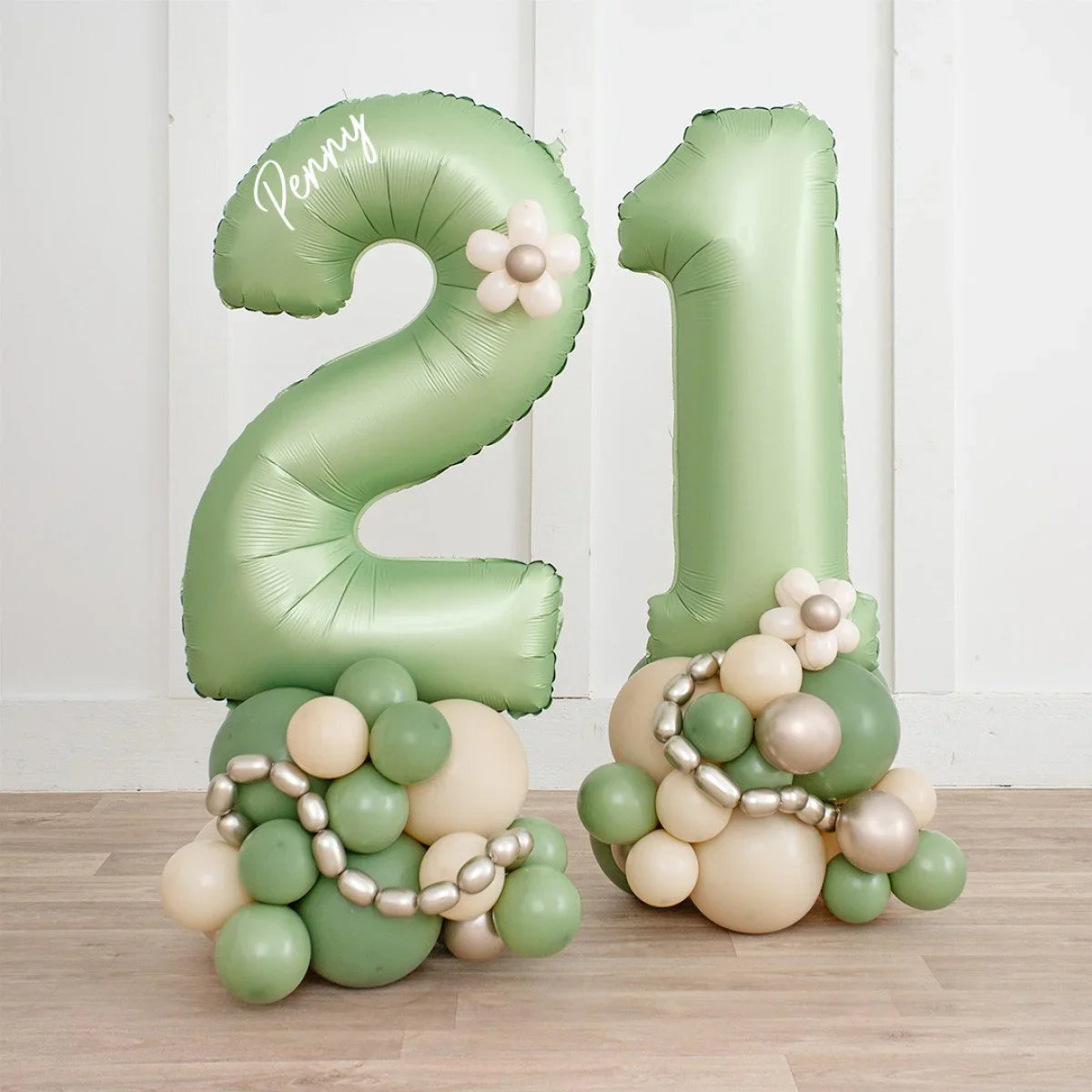 Green number 21 balloons with beige and metallic balloon cluster bases and personalized name Penny