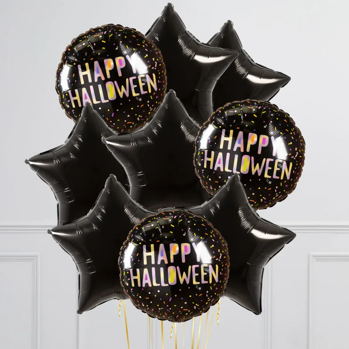 Black star and round Happy Halloween foil balloons with colorful confetti design