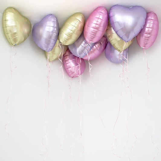 Pastel heart foil helium balloons on ceiling with ribbons, Dubai party decor