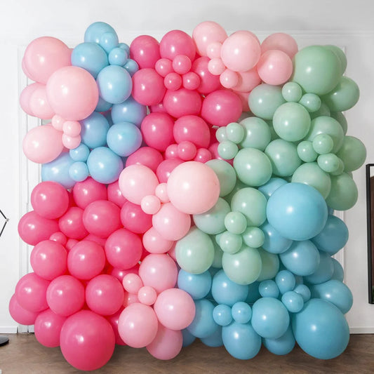Pastel unicorn party balloon wall with pink, blue, and green balloons in Dubai