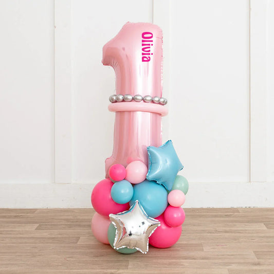 Personalised pink number one balloon stack with pastel and star balloons for first birthday