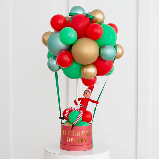 Personalised Elf on the Shelf hot air balloon with red, green, gold balloons and custom base