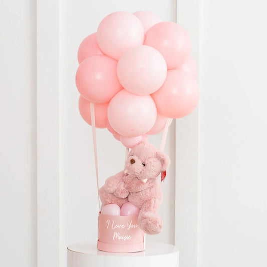 Personalized baby pink hot air balloon with teddy bear and latex balloons Dubai gift