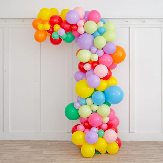 Rainbow Bright Asymmetric Balloon Arch – Bold, Colorful & Celebration-Ready