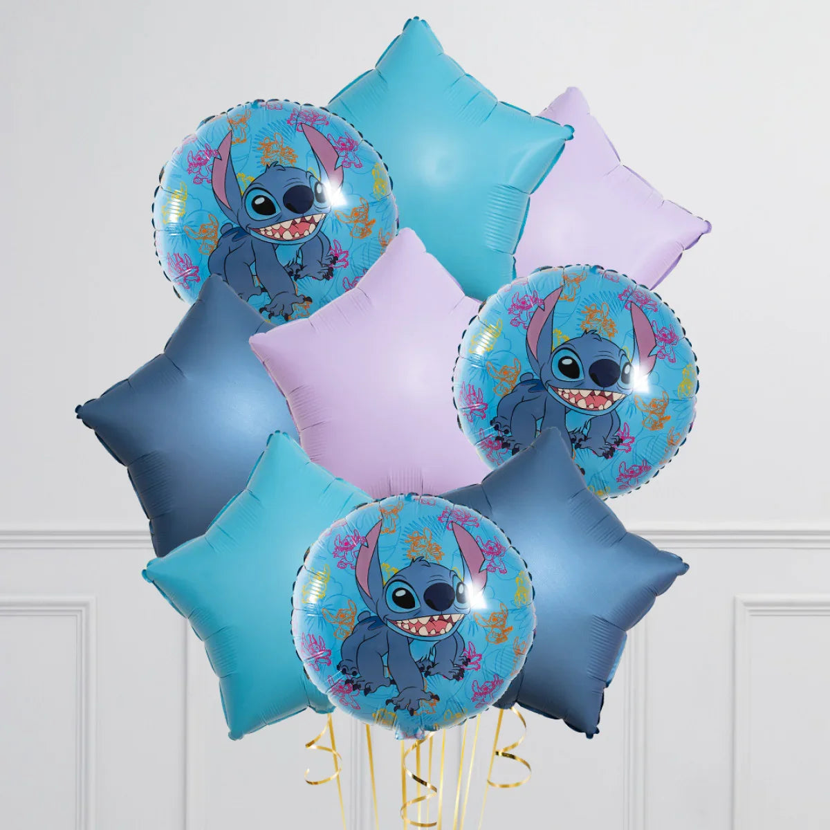 Stitch print star and round foil balloon bunch in blue and purple for party decor