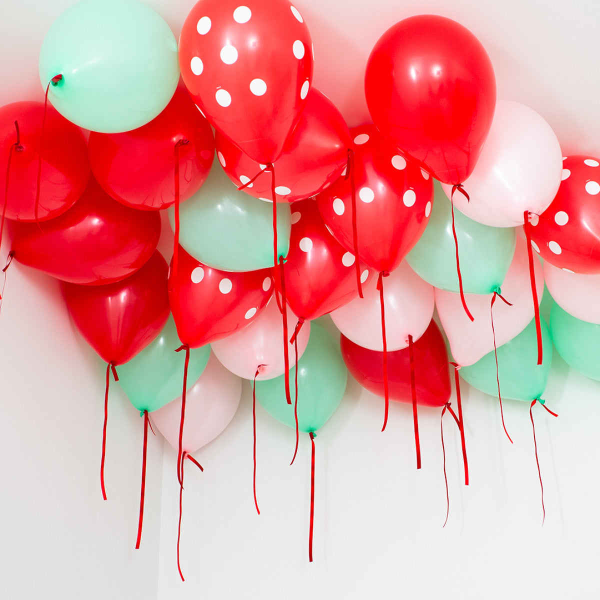 Celebrate with a Ceiling Full of Strawberry Themed Balloons