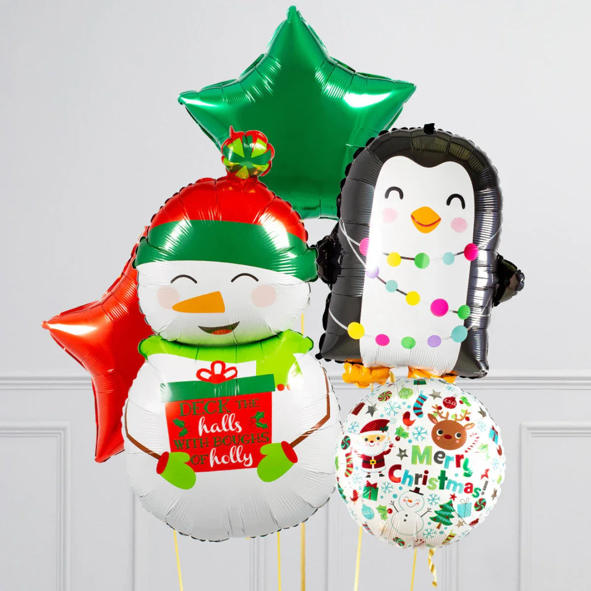 Christmas balloons featuring a snowman holding a holiday gift and a penguin with colorful lights