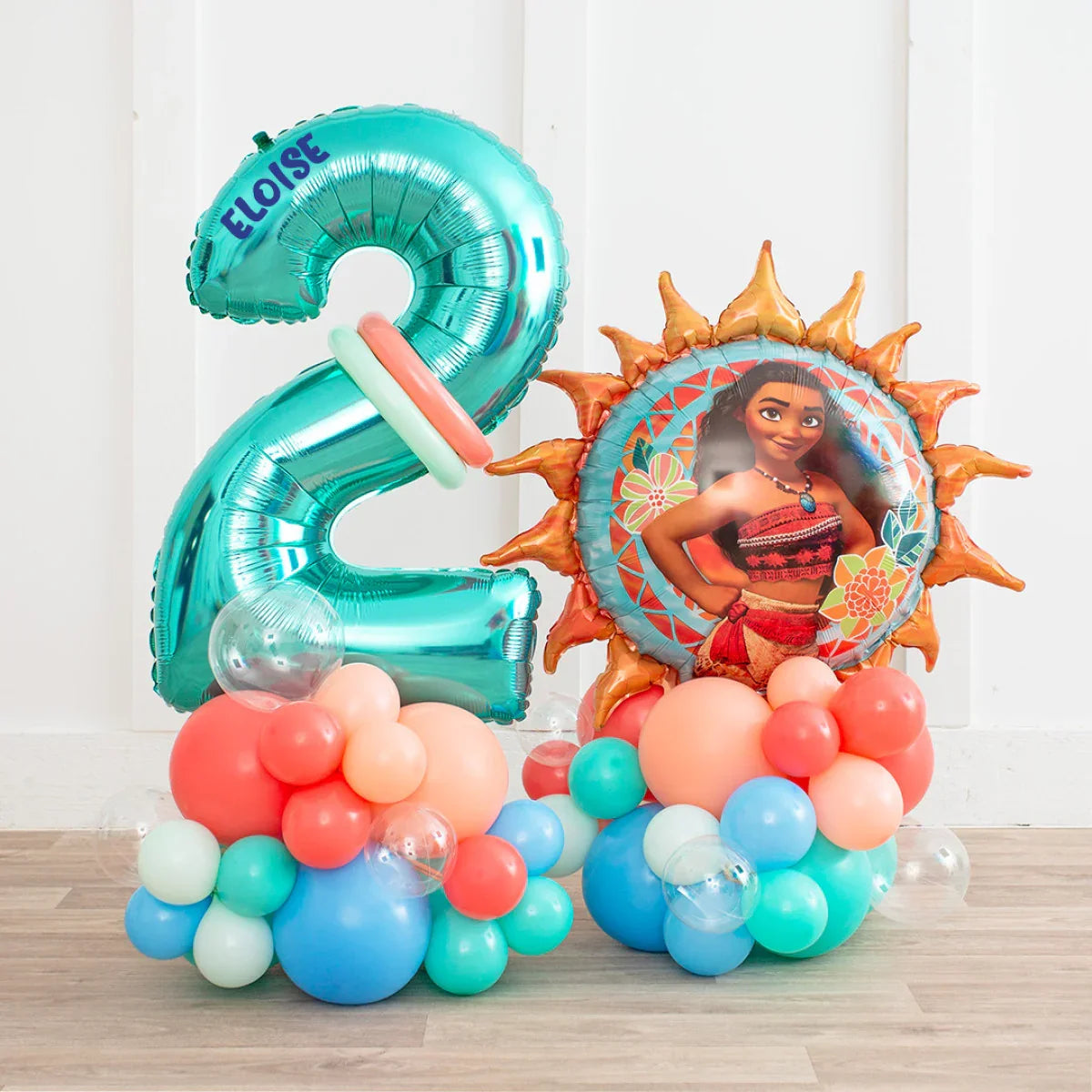 Colorful birthday balloon arrangement with teal number 2 and Moana character foil balloon