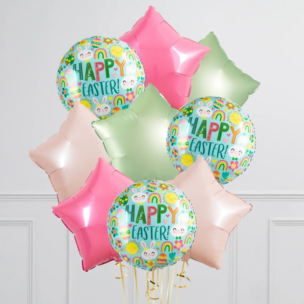 Colorful Easter foil balloons with happy bunny and egg designs, star-shaped pink, green, and beige balloons