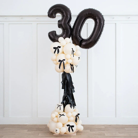 Black Bow Ivory Number Party Pillar in Dubai