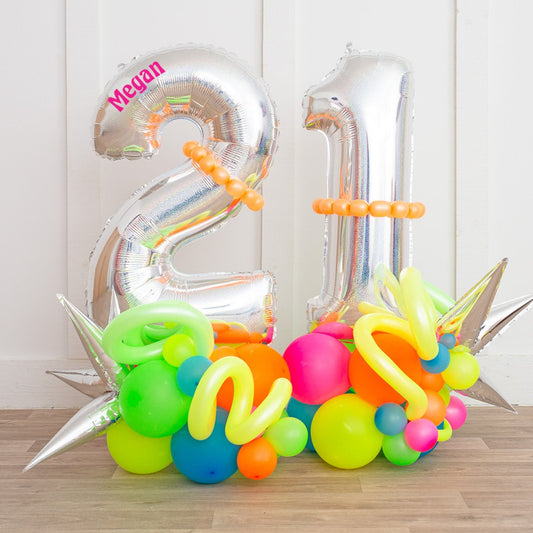 Holographic Silver Number Balloon on Neon Rainbow Stack