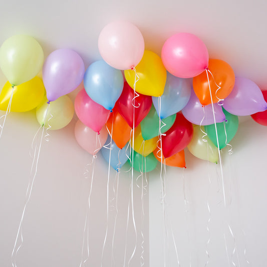 Brighten Your Celebration with Rainbow Bright Biodegradable Latex Ceiling Balloons