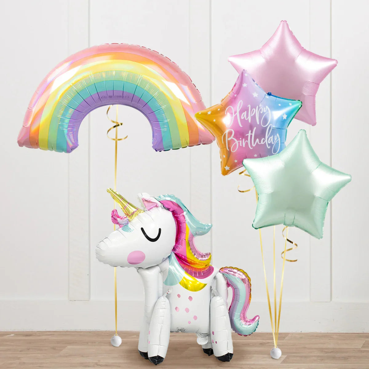 Birthday balloons set with inflatable unicorn, rainbow, and pastel star-shaped balloons